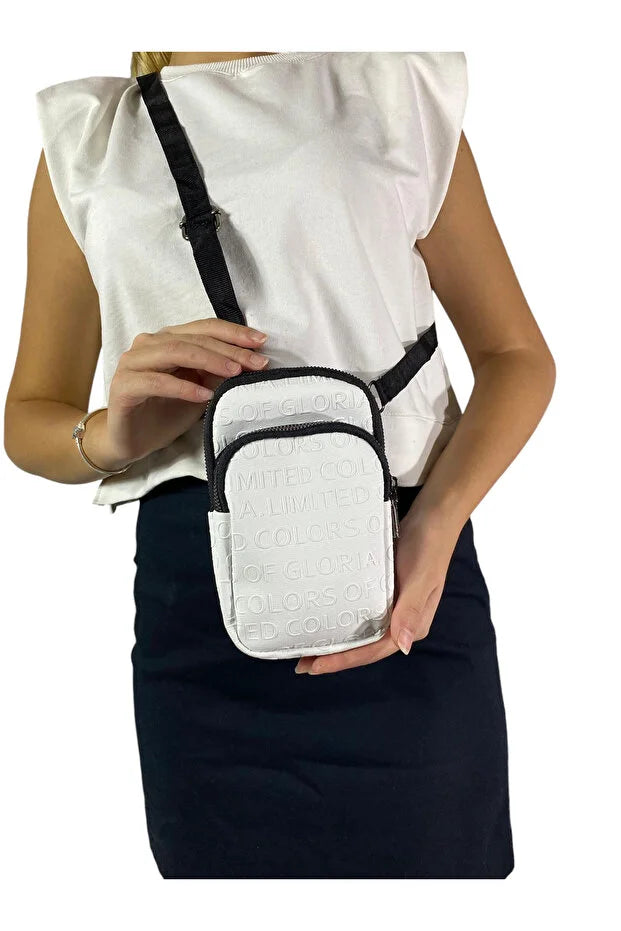 Gloria Taba Two-Eye Strap Phone Bag: Width 9 Cm, Length 18 Cm, Width 6 Cm.